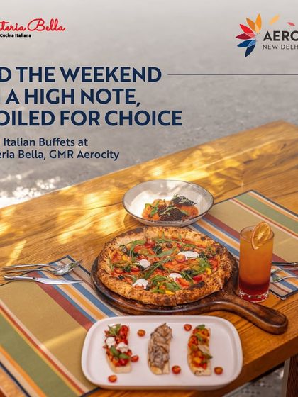 End your weekend on a high note with a grand Italian buffet at L'Osteria Bella. This spread of pizza, bruschetta, and drinks shows how you'll be spoiled for choice with authentic Italian flavours.