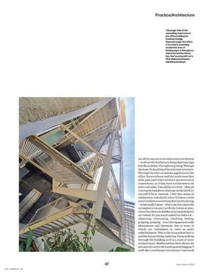 This page from the feature highlights the intricate detailing of the suspended steel walkways and staircases, which form the primary circulation path through the building.