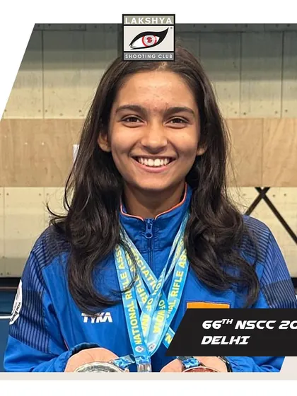 Isha Taksale smiling with her gold medal after setting a new National Record at the 66th NSCC in Delhi.