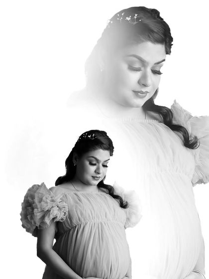 An artistic double exposure in black and white, creating a dreamy and ethereal solo portrait that captures the introspective mood of pregnancy.