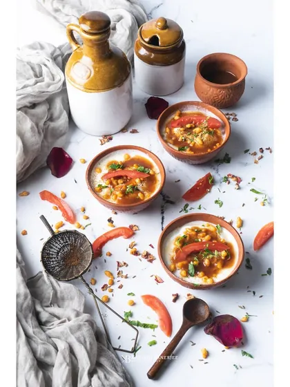 A bright and airy flatlay of Indian chaat. This high-key photography style makes the colors pop, creating a fresh and inviting look that's perfect for blogs, social media, and modern menus.