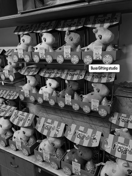 A black and white shot of the jungle-themed birthday hampers, highlighting the fun shapes and silhouettes.