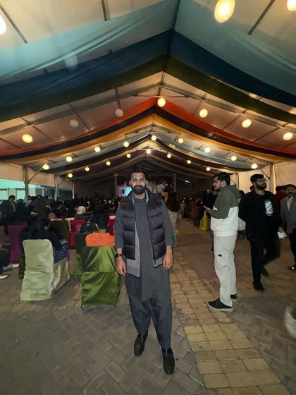 Walking through a decorated tent at an event. I believe life is an art, and how we spend our moments is our unique expression of it.