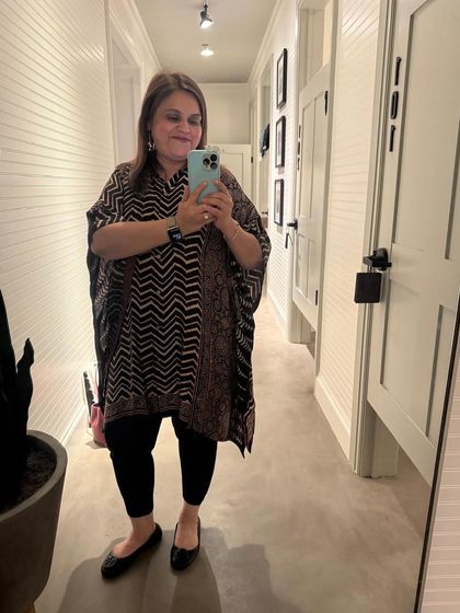 A happy client looking effortlessly chic in one of my Ajrakh print kaftans. I love how she styled it for a comfortable yet fashionable look. It's proof that style and comfort can go hand-in-hand.