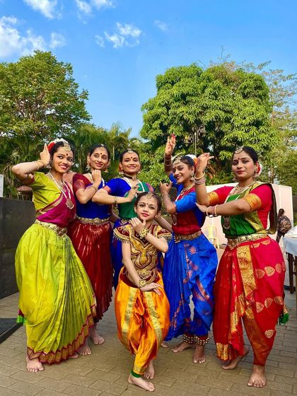 My girls and I enjoying the sunny weather and the success of our performance. These are the moments that build our bond as a dance family.
