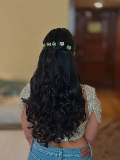 Another view of the half-up style with stone accessories, showing how it adds a pop of color.
