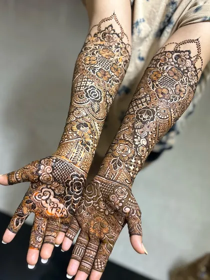 Another angle of this gorgeous bridal design. The mix of floral and traditional patterns is timeless and elegant.