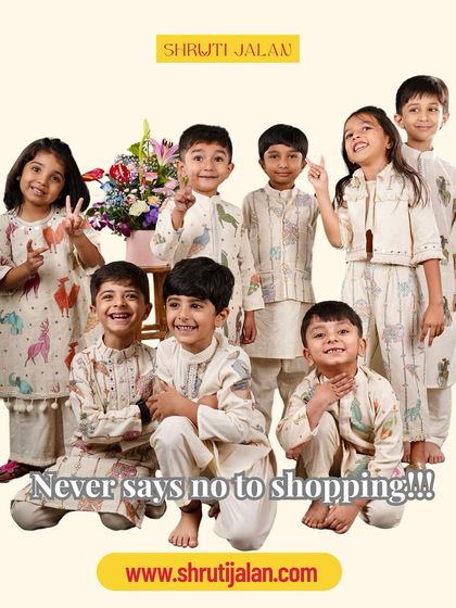 This image captures the fun spirit of my brand. All the kids are dressed in my playful animal-print collection, ready for a day of shopping and fun.