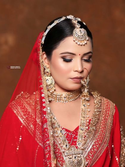 A close-up of the flawless base and soft smokey eye. This is a testament to my advanced makeup techniques that ensure you look perfect.