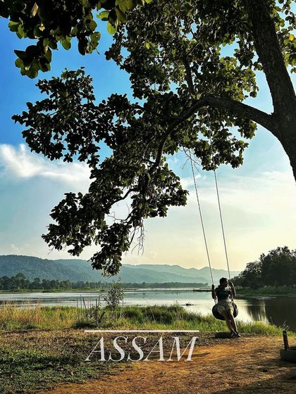 The peaceful riverside in Assam. We encourage travel that appreciates the quiet beauty and diverse landscapes of our country.