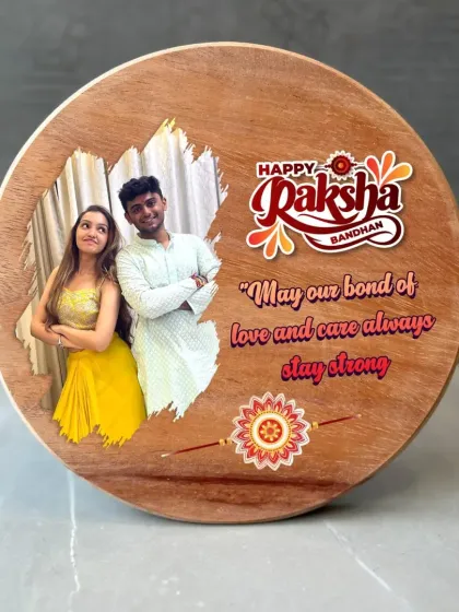 A beautiful wooden frame with a brush effect, personalized with a photo and a heartfelt message for Raksha Bandhan. This round frame is 8x8 inches.
