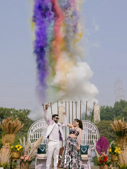 We are all about creating high-energy, picture-perfect moments. For this Afro-jungle themed carnival, a blast of color was the perfect way to kick off the celebration and capture the couple's fun-loving spirit.