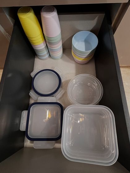 A drawer for reusable party cups and food containers. This is a great way to keep occasional-use items tidy and ready for your next gathering.