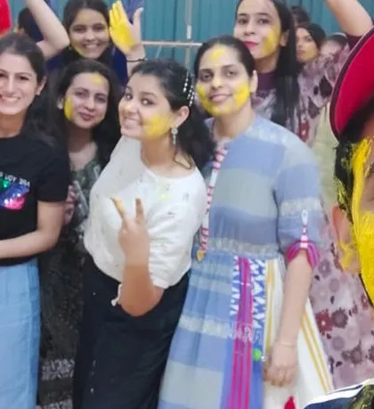 A close-up selfie capturing the fun and messy joy of our Holi celebration. It’s all about letting loose and having a great time together.