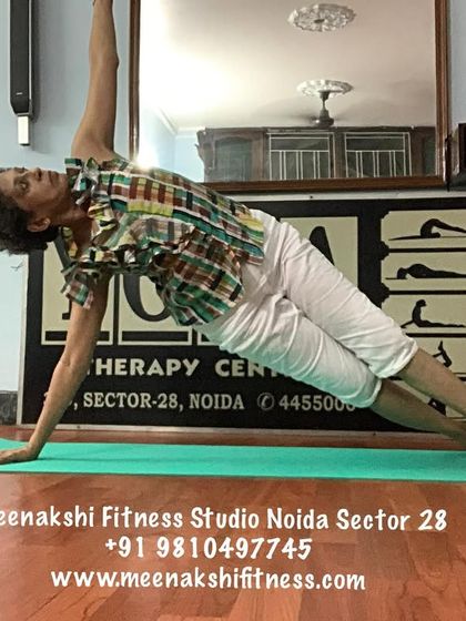 Vasisthasana, or side plank. This pose is excellent for strengthening the arms, wrists, and obliques while challenging your balance.