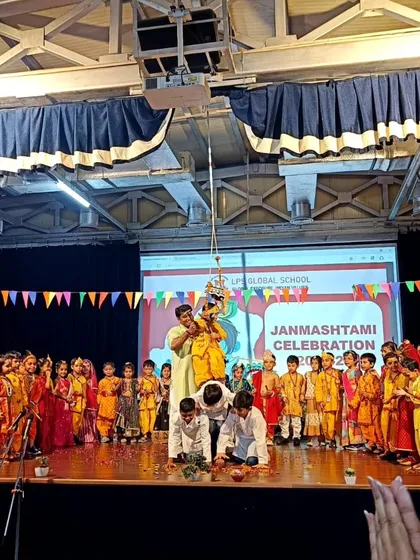 The exciting 'Dahi Handi' ceremony during our Janmashtami celebration. This fun-filled tradition was the highlight of the day, cheered on by everyone.