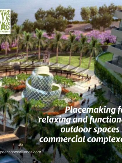 Placemaking is key to our design for commercial complexes. This concept shows a central plaza with unique sculptural elements and lush greenery, creating a functional and relaxing outdoor space that serves as the social heart of the development.