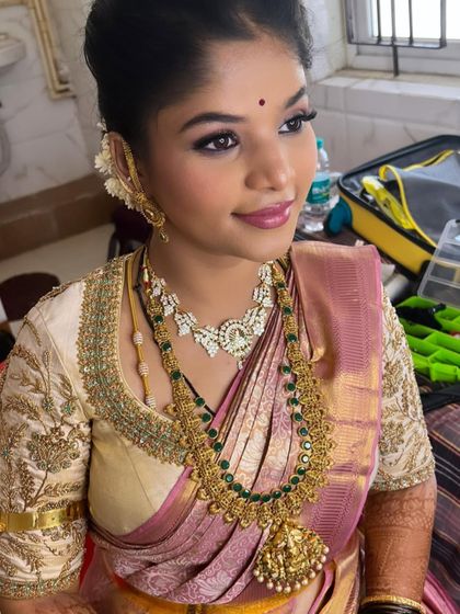 A close-up of the makeup for the post-wedding reception. The eyeshadow has a hint of shimmer, and the lip color is a soft, flattering pink.