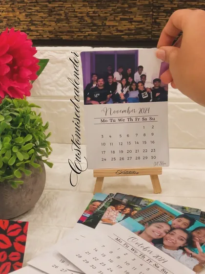 I create custom desk calendars using your 12 favorite photos. This version includes a set of monthly cards and a small wooden easel, making it a beautiful and personal addition to any desk or shelf.