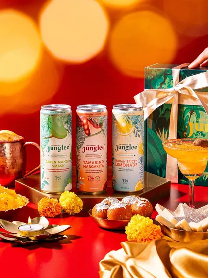 Capturing the festive spirit. This Diwali-themed shoot for Junglee uses diyas, marigolds, and Indian sweets to connect the beverage brand with cultural celebrations.