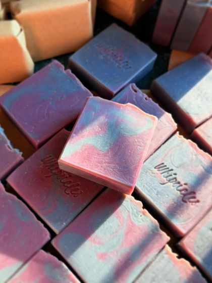 A batch of our custom Lavender Jasmine soaps, ready for a wedding. The beautiful pink and blue swirls make each bar a small piece of art.
