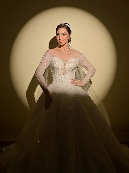 For my brides who dream of a white wedding, I create looks that are ethereal and graceful. This Christian bridal look features soft, romantic makeup and an elegant updo, complementing the beauty of the white gown.
