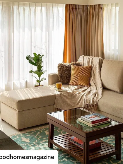 Another view of the 'Calm Abode' living room, where sunlight streams in, creating a warm and peaceful atmosphere. The mix of textiles and the indoor plant adds to the serene, natural feel of the home.