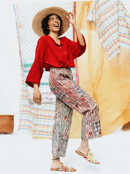 A duplicate of the joyful shot from the featured gallery, included here to maintain the complete story of the Wandering Silk collection. It embodies the brand's vibrant and happy energy.