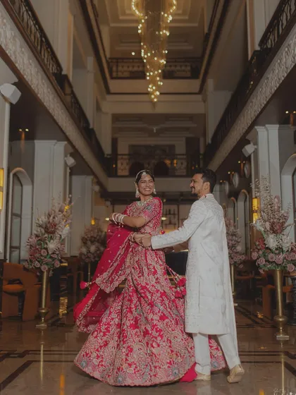 A joyful twirl in the grand lobby of a hotel. We use the architecture and space to create dynamic and elegant portraits.