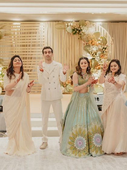 The whole family on the dance floor. These are the moments of shared joy that everyone will remember long after the wedding is over.