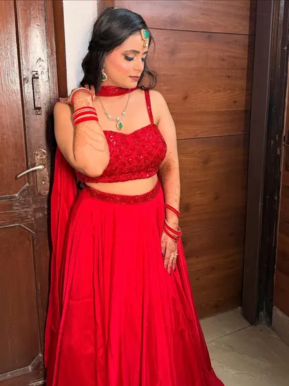 Another angle of this beautiful party look, showing off the intricate details of the lehenga and the flawless makeup.