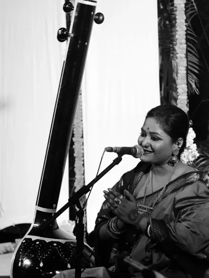 A black and white shot of Rageshri Das, capturing the emotion and grace of her performance. Her concerts are a journey into the heart of Indian classical music.
