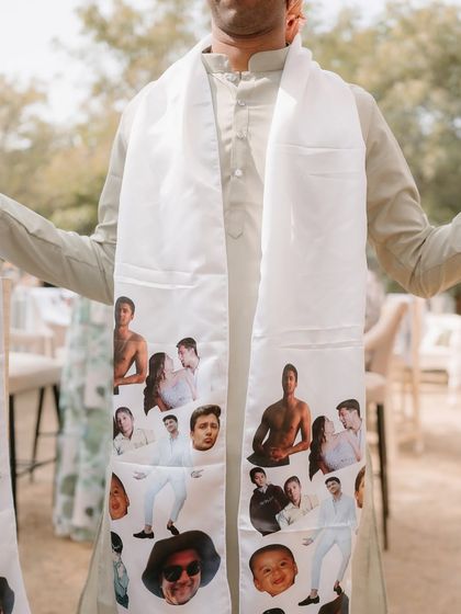 A closer look at the custom-printed stole, a perfect example of how we incorporate personal photos and humor into wedding details.