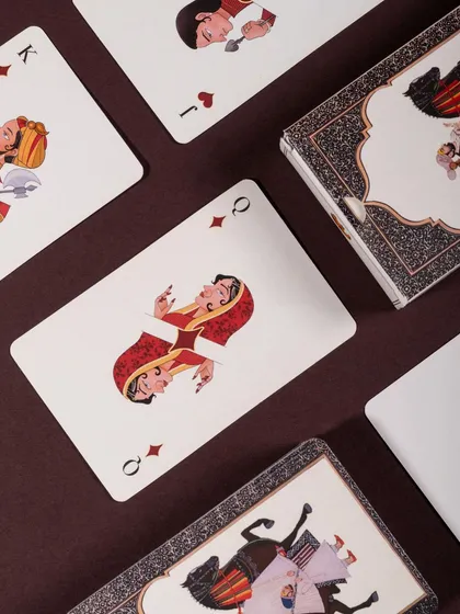 A close-up, detailed shot of the artwork on Namostutay's playing cards. This macro view highlights the quality of the printing and the beauty of the illustrations.