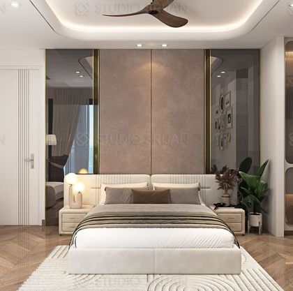 The main view of the bed, featuring a headboard with smoked mirror panels on either side that enhance the sense of space. The tray ceiling with cove lighting adds a touch of elegance.
