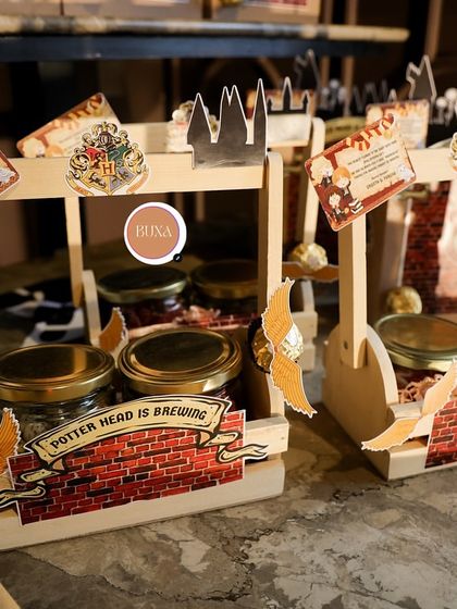 Another look at the budget-friendly Harry Potter hampers, showing the custom stickers and Golden Snitch details.