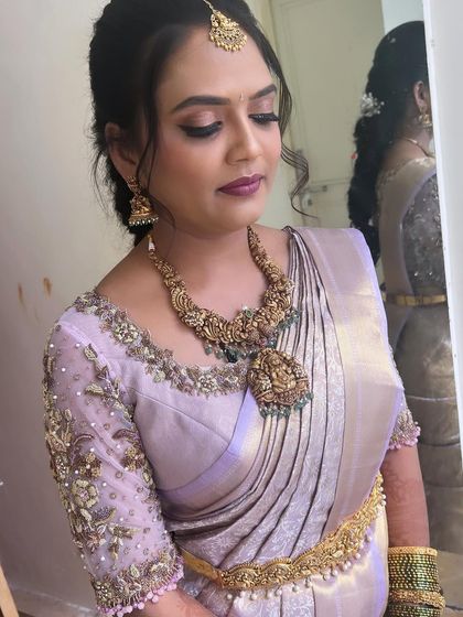 The beautiful Kavyashree for her post-muhurtham reception. We chose a soft lavender saree and I created a smoky eye and a mauve lip to create a sophisticated and modern traditional look.