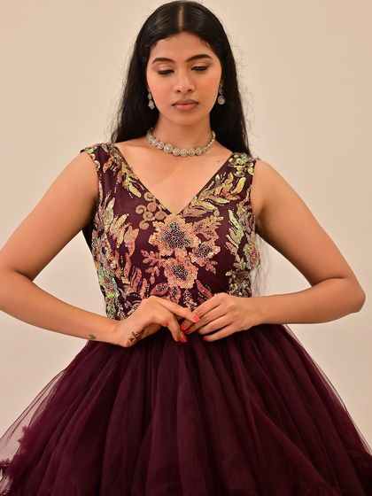 A close-up of the beautiful gown and makeup.