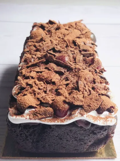 A tea-time twist on a classic. My Black Forest tea cake has a moist chocolate sponge, layers of whipped cream, and bursts of cherry, making it a simple yet indulgent treat.