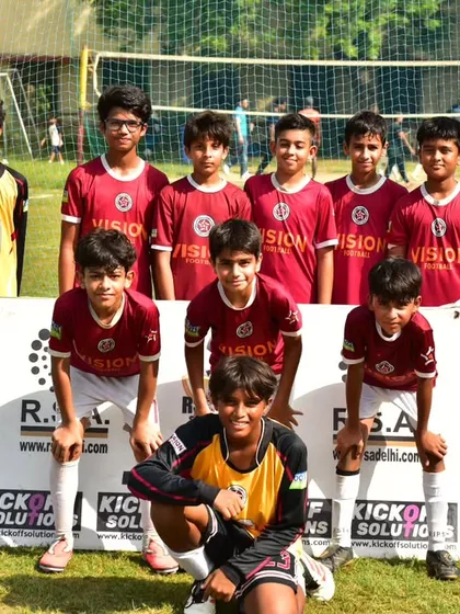 Our U-11 team posing for a photo before their match at the RSA Cup. They look focused and ready to represent the academy.