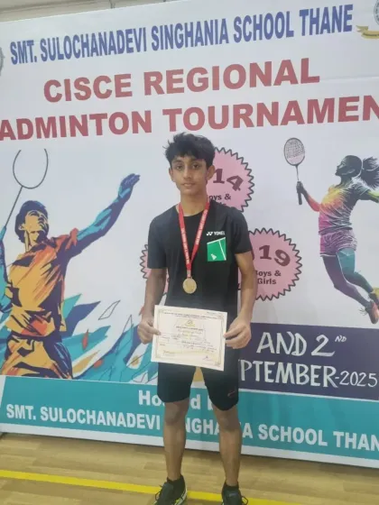 Zehn Masani with his silver medal at the CISCE Regional Badminton Tournament. This achievement also led to his selection for the Maharashtra State team.