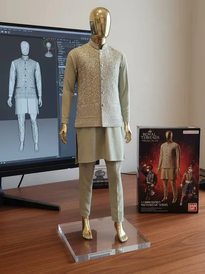 From a digital concept to a tangible style statement. This image showcases the creation of a sophisticated mint green kurta set, paired with a beautifully embroidered sleeveless jacket, perfect for a daytime wedding event.