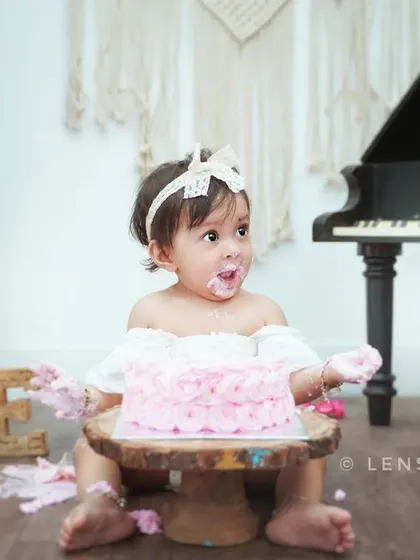 A first birthday is a huge milestone, and what's a birthday without some cake? My cake smash sessions are all about letting your baby have fun and getting messy.