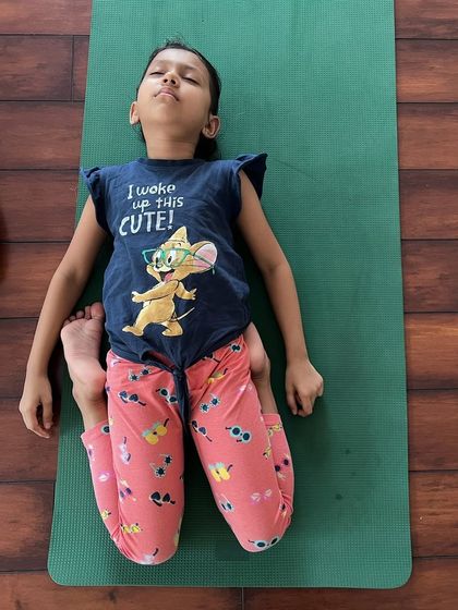 "I woke up this cute." This little yogi finds her rest, proving that yoga is for every heart and every mood.