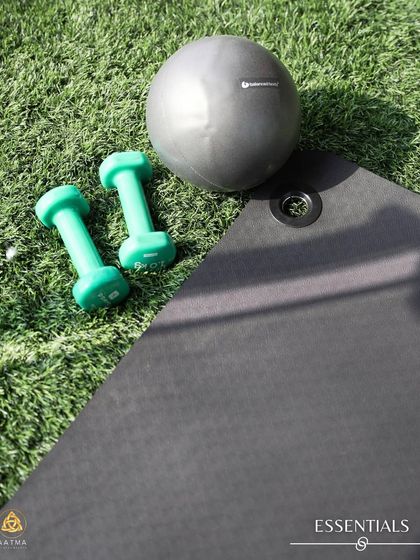 The essentials for a mat workout. The mat provides cushioning, while the ball and light weights can be used to add challenge and variety to classic exercises.