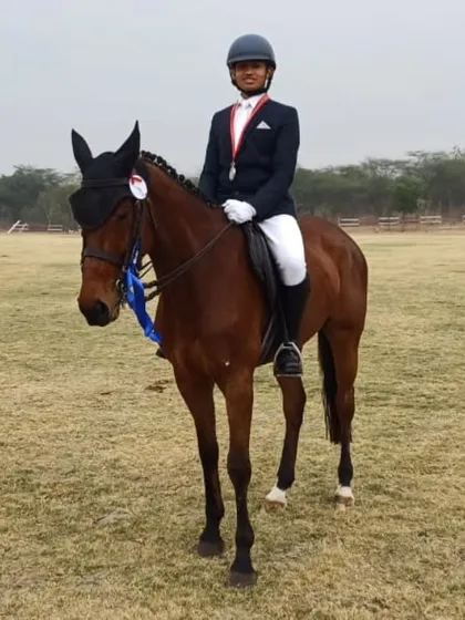 A champion in the making. One of our riders stands proudly with his horse after competing at the Delhi Horse Show 2024.