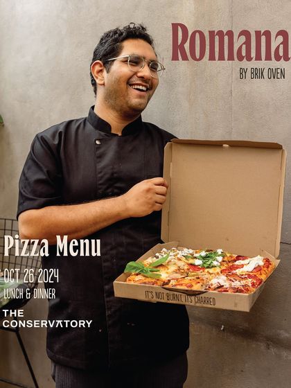 Our chef Divyansh Gupta, the pro behind our Pizza Romana pop-up, presenting a box of assorted slices.