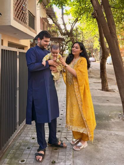 Another shot from our Roop Chaudas celebration, this one a full-length family portrait. It showcases our complete festive look and the happy, relaxed vibe of our family.