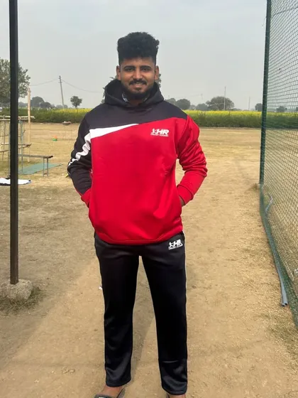 One of our players looking confident and ready in the academy tracksuit. We build not just skills, but also character.