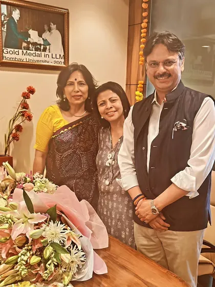 With my family during our office opening puja. Their unwavering support has been the bedrock of my career and my activism.